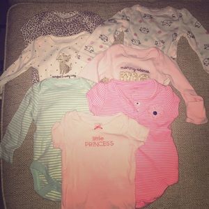 Bundle of 7 newborn girl onesies